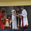 Pontius Pilate (Lee Azevedo) washes his hands, with the help of the Roman servers.